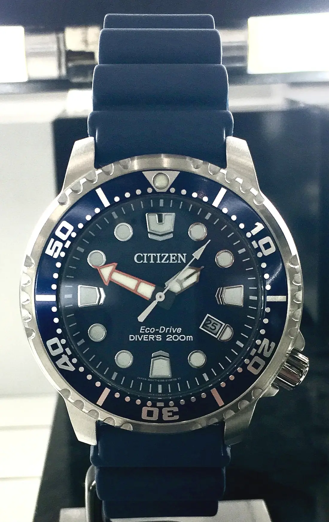 A dive watch dial marked Diver’s 200m with a rotating timing bezel