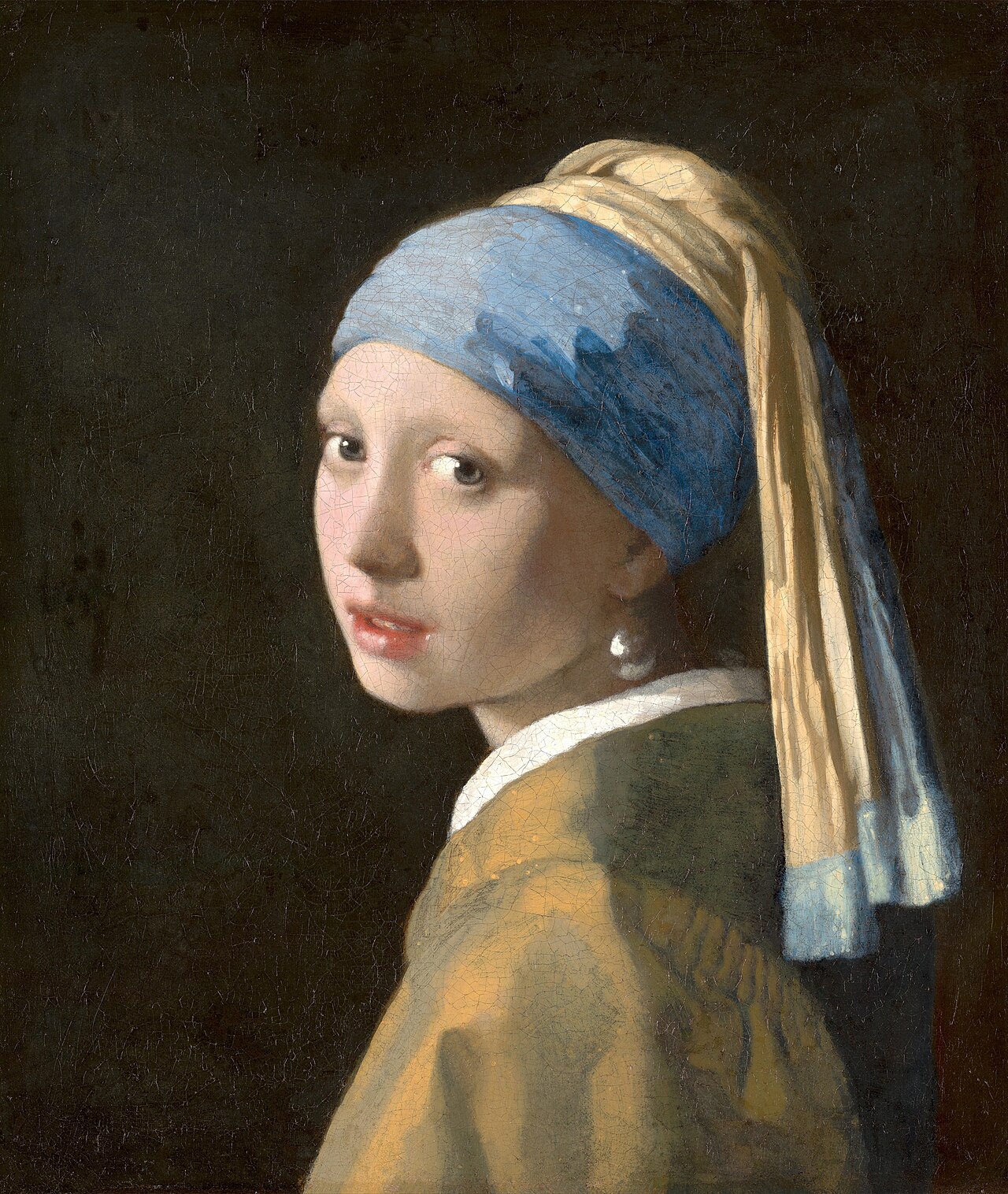 Johannes Vermeer’s Girl with a Pearl Earring, a girl in a blue turban