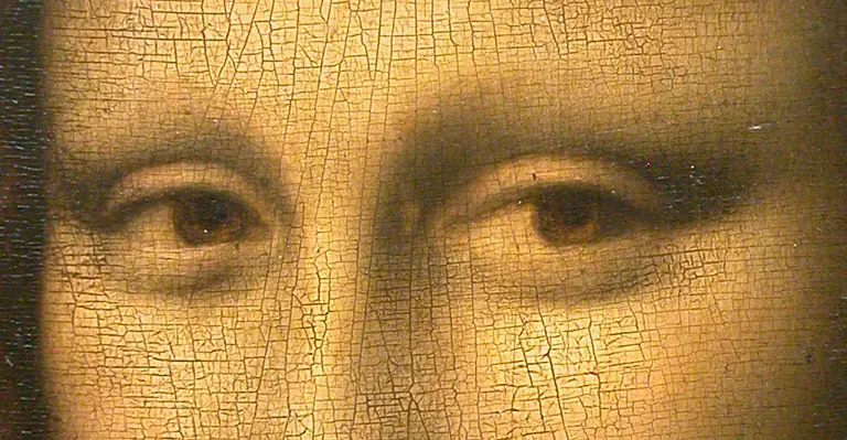 Extreme close-up of the eyes in the Mona Lisa showing a dense network of fine age cracks