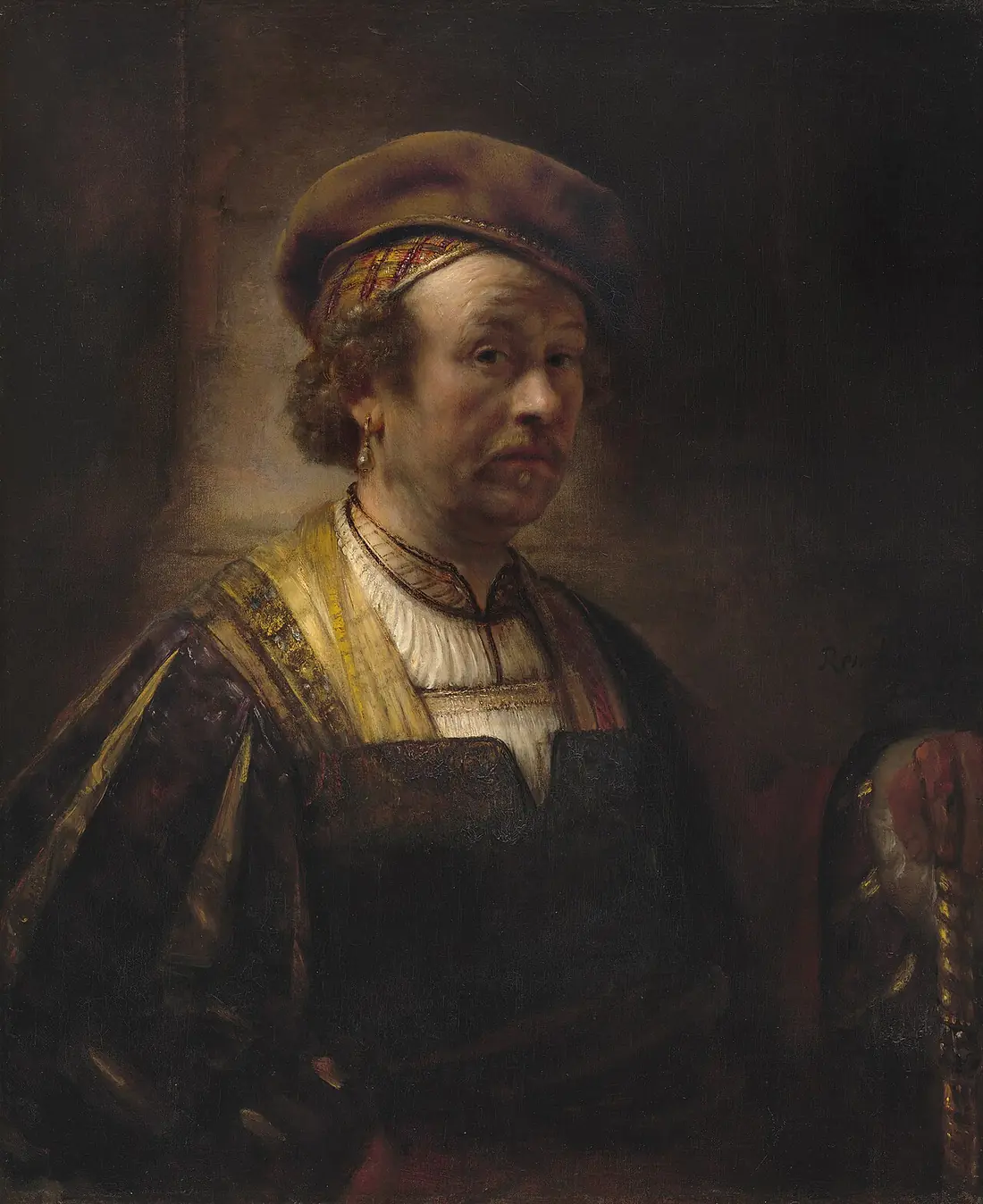 A seventeenth-century portrait of Rembrandt in a beret and gold-trimmed cloak, catalogued as a workshop production